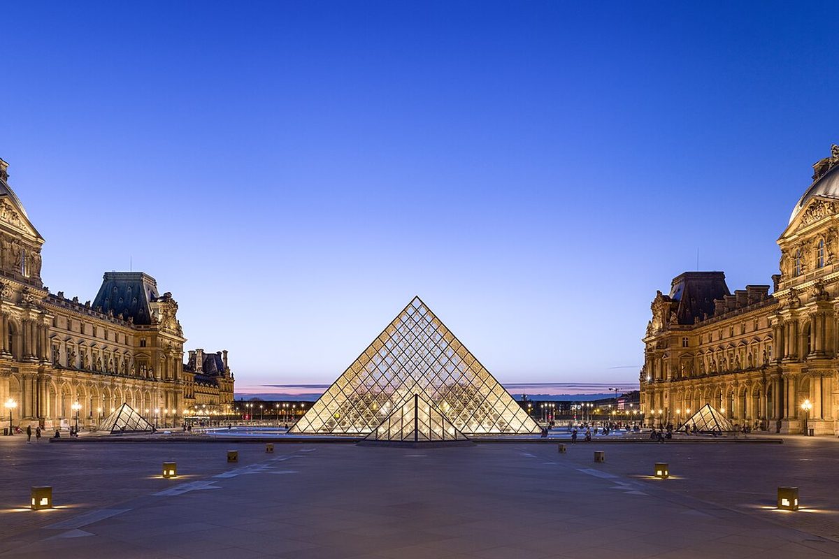 Louvre pyramid at dusk