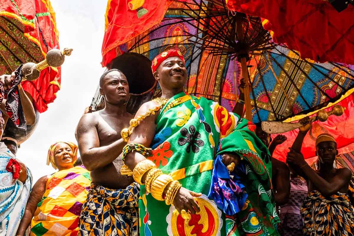 Ashanti chief in rich kente and gold regalia, Kumasi, Ghana